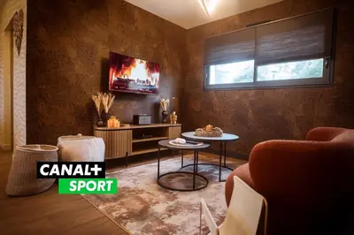 Coin salon dans l'établissement L'EDEN - Refuge romantique avec balnéo & sauna