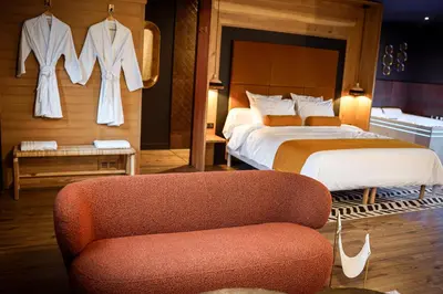 Un ou plusieurs lits dans un hébergement de l'établissement L'EDEN - Refuge romantique avec balnéo & sauna
