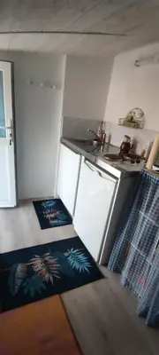 Cuisine ou kitchenette dans l'établissement Studio Propre et Cosy