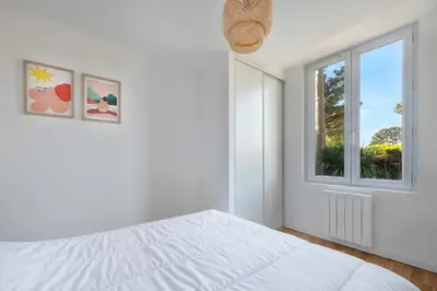 Un ou plusieurs lits dans un hébergement de l'établissement Maison rénovée pour 8 - 200m Tharon plage