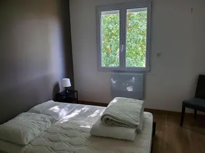 Un ou plusieurs lits dans un hébergement de l'établissement Maison du Domaine (Gîte)