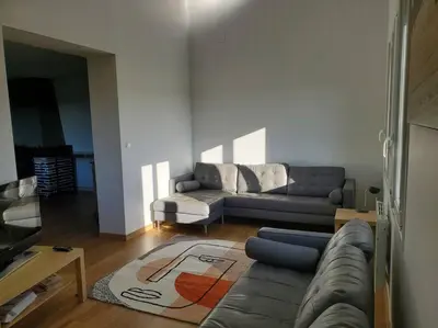 Coin salon dans l'établissement Maison du Domaine (Gîte)