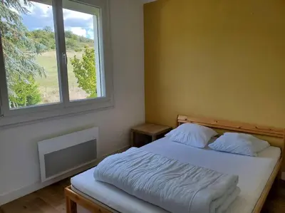 Un ou plusieurs lits dans un hébergement de l'établissement Maison du Domaine (Gîte)