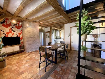 Télévision ou salle de divertissement dans l'établissement La Casa Duplex
