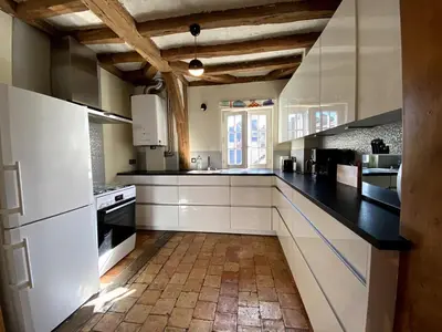 Cuisine ou kitchenette dans l'établissement La Casa Duplex