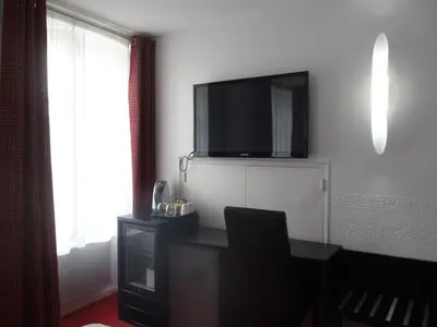 Télévision ou salle de divertissement dans l'établissement Auberge bretonne