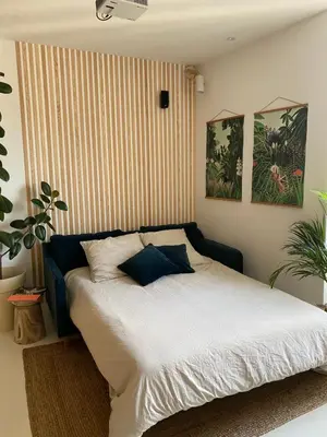 Un ou plusieurs lits dans un hébergement de l'établissement Appartement cosy, Gare 5 minutes et Home cinéma
