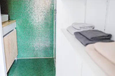 Un ou plusieurs lits dans un hébergement de l'établissement Appartement cosy, Gare 5 minutes et Home cinéma