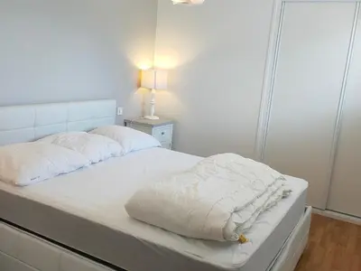 Un ou plusieurs lits dans un hébergement de l'établissement Appartement à St Jean de Monts - Confort 3 pers, Proche Plage, WIFI - FR-1-323-454