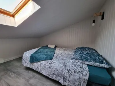Un ou plusieurs lits dans un hébergement de l'établissement Studio cocooning au calme, proche centre-ville et centre commercial