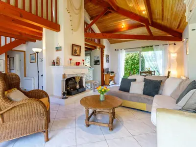 Coin salon dans l'établissement Holiday Home L'Oiseau Bleu by Interhome