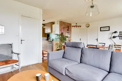 Coin salon dans l'établissement Entre plage et marais salants, maison pour 6