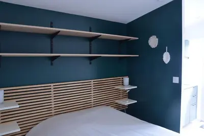 Un ou plusieurs lits dans un hébergement de l'établissement Studio confortable avec terrasse privée
