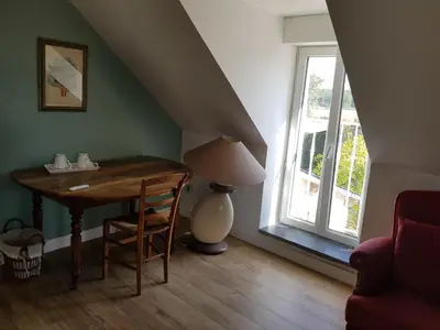 Coin salon dans l'établissement Chambre double dans longère