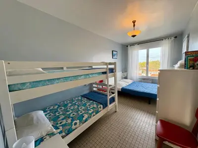Un ou plusieurs lits dans un hébergement de l'établissement Appartement lumineux avec balcon face mer, idéal jusqu'à 5 personnes - FR-1-323-298