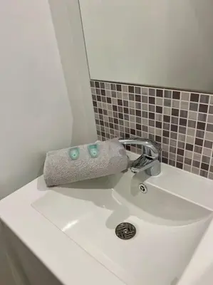 Salle de bains dans l'établissement * Cosy & Netflix Proche Centre *