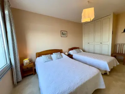 Un ou plusieurs lits dans un hébergement de l'établissement Appartement lumineux proche de la plage pour 5 pers - FR-1-323-312