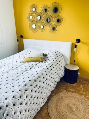 Un ou plusieurs lits dans un hébergement de l'établissement Grand appartement cosy 4ch