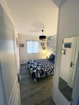 Un ou plusieurs lits dans un hébergement de l'établissement 1 chambre d'hôte moderne au calme à 15mn du Puy du Fou