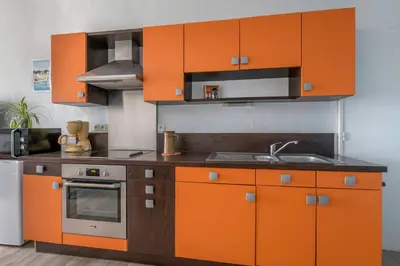 Cuisine ou kitchenette dans l'établissement À 50m de la plage, Appartement vue mer