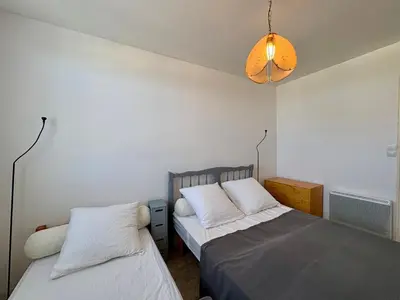 Un ou plusieurs lits dans un hébergement de l'établissement Magnifique vue mer, apt 2 chambres pour 5 pers, proche avenue de la Mer - FR-1-323-311