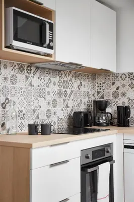 Cuisine ou kitchenette dans l'établissement Le Grand Bleu - Wifi fibre/Linge/Accès cour