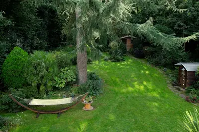 Jardin de l'établissement Le Nid du Massereau - Chambres d'hôtes avec piscine près de Nantes et Loire à vélo