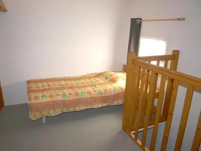 Un ou plusieurs lits dans un hébergement de l'établissement Maison familiale à Saint-Jean-de-Monts, piscine commune, parking privé - FR-1-323-377
