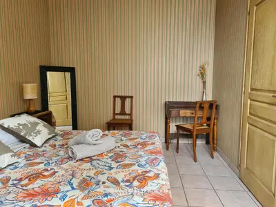 Un ou plusieurs lits dans un hébergement de l'établissement Le Repère Charmant Appartement Familial au Cœur des Herbiers à 12 min du Puy duFou
