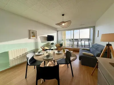 Coin salon dans l'établissement Appartement rénové à Saint Jean de Monts - Face à la mer - Internet rapide - FR-1-323-496