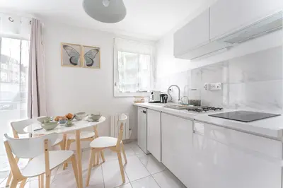 Cuisine ou kitchenette dans l'établissement Le Rex - Bel appt avec sauna