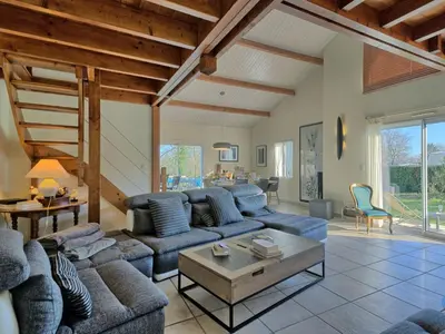 Coin salon dans l'établissement Holiday Home Charme de la Fradinière by Interhome