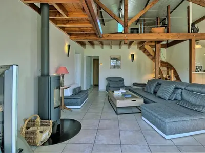 Coin salon dans l'établissement Holiday Home Charme de la Fradinière by Interhome