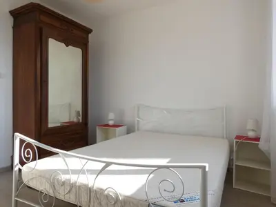 Un ou plusieurs lits dans un hébergement de l'établissement Maison 2 Chambres près Plage et Commerces - Parking Privé - FR-1-323-366