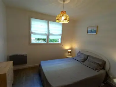 Un ou plusieurs lits dans un hébergement de l'établissement Appartement 2 chambres près de la plage - Animaux admis - FR-1-323-314