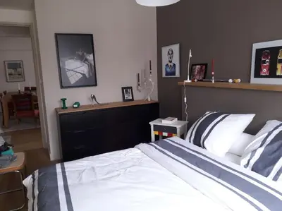 Un ou plusieurs lits dans un hébergement de l'établissement Appt 3 chambres hyper centre très calme très clair quartier place Royale, parking gratuit