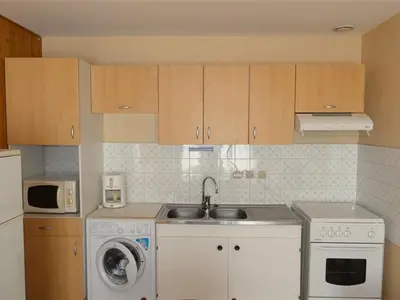 Cuisine ou kitchenette dans l'établissement Maison calme proche plage, animaux admis, parking - FR-1-323-376