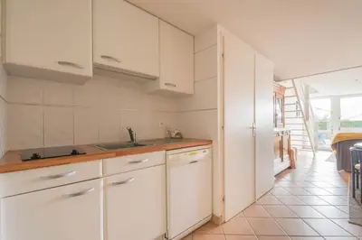 Cuisine ou kitchenette dans l'établissement Maison dans résidence calme + piscine à Pornic