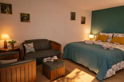 Un ou plusieurs lits dans un hébergement de l'établissement RELAI DU CHATEAU APPARTHOTEL