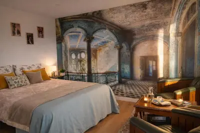 Un ou plusieurs lits dans un hébergement de l'établissement RELAI DU CHATEAU APPARTHOTEL