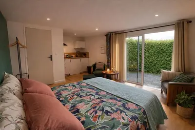Un ou plusieurs lits dans un hébergement de l'établissement RELAI DU CHATEAU APPARTHOTEL