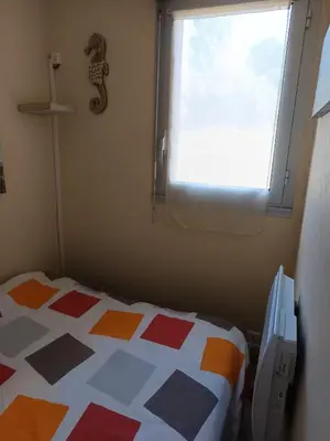 Un ou plusieurs lits dans un hébergement de l'établissement Casa Marina - Le Petit Bleu Vue mer