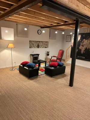 Coin salon dans l'établissement Gîte campagne