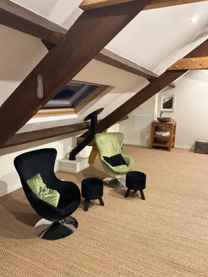 Coin salon dans l'établissement Gîte campagne