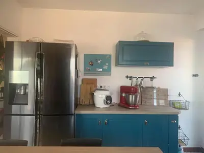 Cuisine ou kitchenette dans l'établissement Maison a étages bord de mer