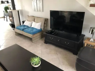 Télévision ou salle de divertissement dans l'établissement MAISON NOTRE DAME DE MONTS