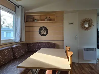 Coin salon dans l'établissement Mobil-home 5 places