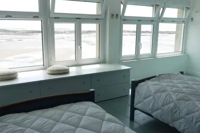 Un ou plusieurs lits dans un hébergement de l'établissement Appartement NOIRMOUTIER