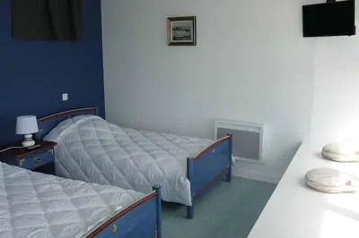 Un ou plusieurs lits dans un hébergement de l'établissement Appartement NOIRMOUTIER