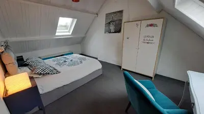 Un ou plusieurs lits dans un hébergement de l'établissement Un petit coin de paradis près de Rennes
